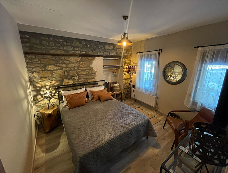 Vrachos est. 1925, historic apartments, restored apartments, guesthouse, Vrachos Kastoria accommodation, apartments for stay, self-catering apartments, Vrachos, Kastoria, Mount Odria, Western Macedonia, Greece travel, Greek countryside stay, fully-functional kitchen, shared outdoor patio, indoor lounge area, accessible apartment (PWD), nature and tradition, world-class stay, explore nature, traditional stay, getaway, vacation rental, vacation Greece, holiday in Greece, Greece travel, relaxing getaway, peaceful retreat, Greek holiday, romantic escape, family vacation Greece, short-term rental, accommodation with character, authentic Greek experience, mountain vacation, nature retreat, hiking in Greece, mountain biking, outdoor activities Greece, nature trails, scenic views, bird watching, eco-tourism, fresh mountain air, traditional Greek village, historic stay, cultural tourism, Greek heritage, local Greek life, winery tours, archaeological sites Kastoria, Vrachos est. 1925 vacation, apartments with a view, Vrachos Kastoria guesthouse, unique stay Greece, restored stone house, traditional architecture, patio garden stay, lounge area for guests.