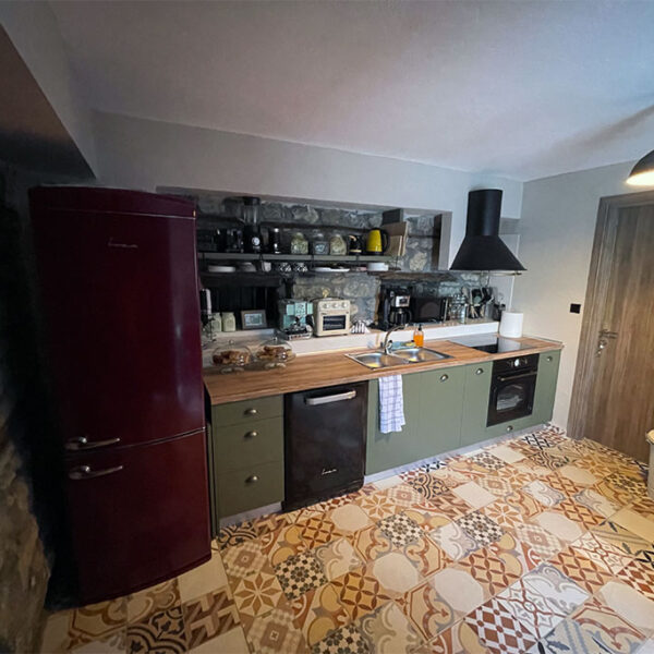 Vrachos est. 1925, historic apartments, restored apartments, guesthouse, Vrachos Kastoria accommodation, apartments for stay, self-catering apartments, Vrachos, Kastoria, Mount Odria, Western Macedonia, Greece travel, Greek countryside stay, fully-functional kitchen, shared outdoor patio, indoor lounge area, accessible apartment (PWD), nature and tradition, world-class stay, explore nature, traditional stay, getaway, vacation rental, vacation Greece, holiday in Greece, Greece travel, relaxing getaway, peaceful retreat, Greek holiday, romantic escape, family vacation Greece, short-term rental, accommodation with character, authentic Greek experience, mountain vacation, nature retreat, hiking in Greece, mountain biking, outdoor activities Greece, nature trails, scenic views, bird watching, eco-tourism, fresh mountain air, traditional Greek village, historic stay, cultural tourism, Greek heritage, local Greek life, winery tours, archaeological sites Kastoria, Vrachos est. 1925 vacation, apartments with a view, Vrachos Kastoria guesthouse, unique stay Greece, restored stone house, traditional architecture, patio garden stay, lounge area for guests.